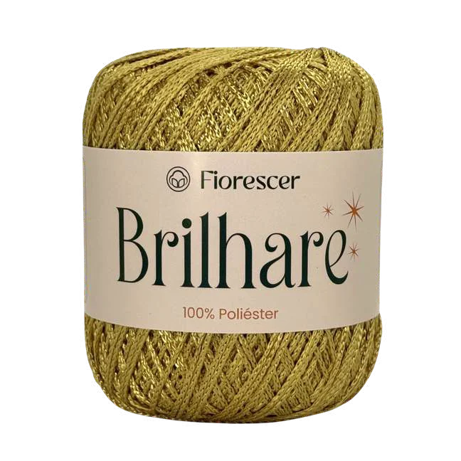 Novelo de Fio Brilhare dourado com etiqueta Fiorescer